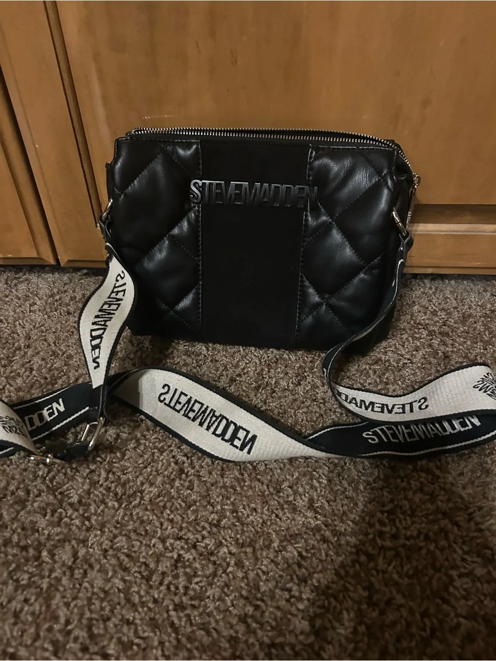 Steve Madden Black Quilted Messenger Bag with White Logo Strap